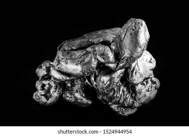 Natural Platinum Nugget Isolated On Black Background