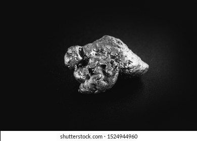 Natural Platinum Nugget Isolated On Black Background