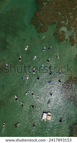 Similar – Aerial Summer View Of Clear Ocean Water Full Of Tourists