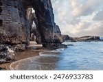 Natural rock arches on Cathedrals beach  in low tide (Cantabric coast, Lugo (Galicia), Spain).