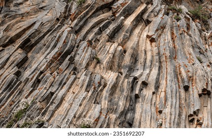 natural rock background texture. rock formation, unusual mountain topography, geological backdrop. Basalt columns formation - Shutterstock ID 2351692207