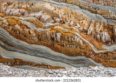 Natural rock texture of a colorful rock formations in silence beach (playa del Silencio) in Asturias, north of Spain. - Shutterstock ID 2212362831