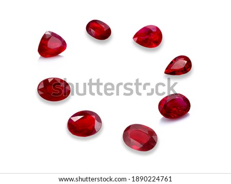 Natural ruby gemstones on white background