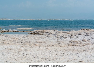 Natural Salt On Lowest Salty Lake In World Dead Sea, Full Of Minerals Near Luxury Vacation Resort Ein Bokek, Perfect Place For Medical Treatments, Climatotherapy, Thalassotherapy And Heliotherapy.