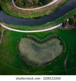 Natural Shape Of Heart In Park With River