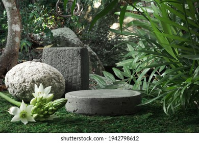 Natural stone   concrete podium in tropical forest and flowers  Empty showcase for packaging product presentation  Background for cosmetic products  scene and green leaves  Mock up pedestal 