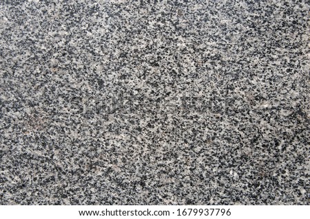 Natural stone. Grey, black and white granite texture, granite surface and background. Material for decoration texture, interior design