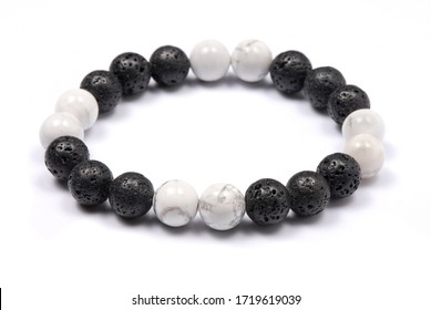 Natural stone jewelry bracelets. Lucky bracelet isolated on white background. Handmade bead bracelet, bracelet made of stone round, Colorful, studio quality, agate, lava