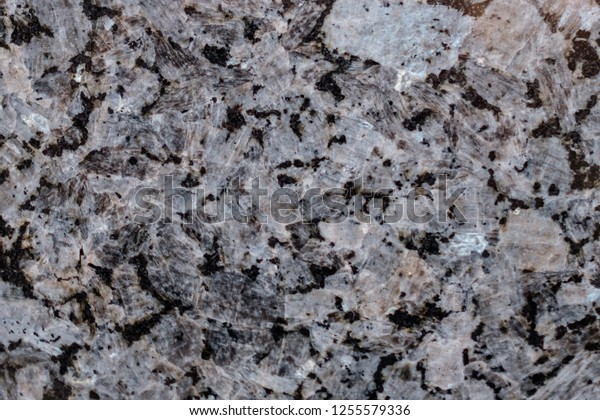 Natural stone. Pink granite.\
Black. Grey. Facing material. Bright hard granite rock texture.\
Granite tone background texture. Granitic untreated surface.\
Texture