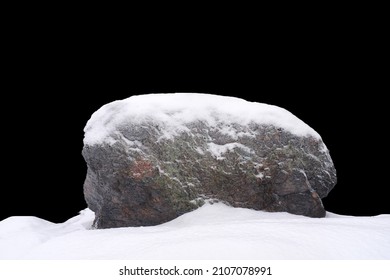 Natural Stone In Snow Isolated On Black Background. High Quality Photo