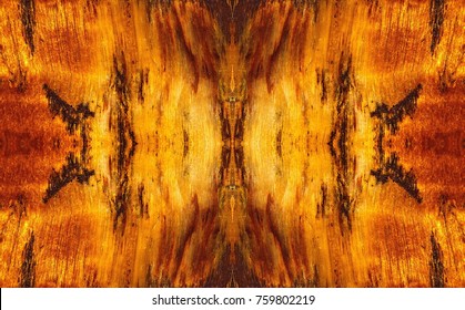 Natural Stone Tiger Eye Symmetric Pattern. Detail Of Gemstone Tiger Eye With A Golden Color Contrasted With Brown. The Image With The Mirror Effect.