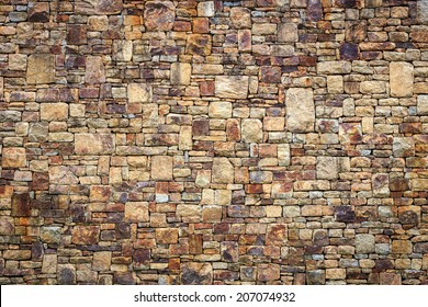 Natural stone wall texture for background - Shutterstock ID 207074932