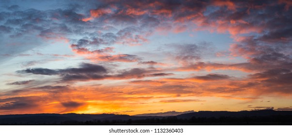 natural-sunset-sunrise-over-field-260nw-1132360403.jpg