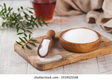 Natural Sweetener In A Wooden Spoon. Sugar Substitute. Erythritol