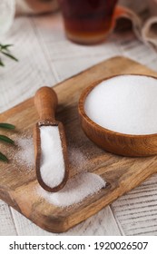 Natural Sweetener In A Wooden Spoon. Sugar Substitute. Erythritol