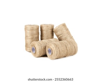 Natural twine rolls displayed in an artistic arrangement showcasing their texture and color, perfect for various crafting and gardening projects or decorating tasks.