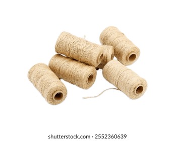 Natural twine spools arranged creatively, showcasing five rolls of durable and versatile twine ideal for crafting, gardening, and various DIY projects.