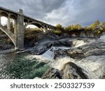 Natural waterfall with bridge overpass in Spokane, WA. 