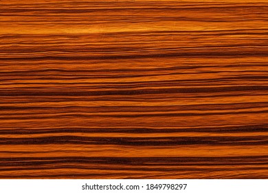 Natural Wooden Background. Cut African Mahogany Close-up.