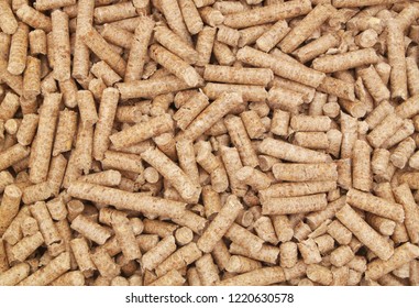 Natural wooden pellets background or pattern.