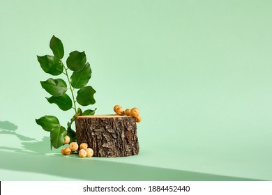 Natural wooden podium display with leaf shadow. Product presentation beige background. Cosmetics or beauty product promotion trendy minimalist mockup.