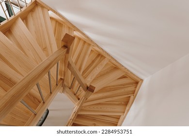 Natural wooden and white wall. Minimalist modern home interior. Top view, overhead view - Powered by Shutterstock