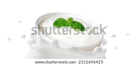 Natural Yoghurt in bowl falling into fermented milk splashed isolated on white background, The movement of Organic dairy products, Healthy drink probiotic, Ketogenic diet food for health care concept.