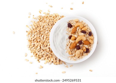 natural yogurt with oats and nuts in ceramic bowl top view isolated white background. Healthy eating concept - Powered by Shutterstock