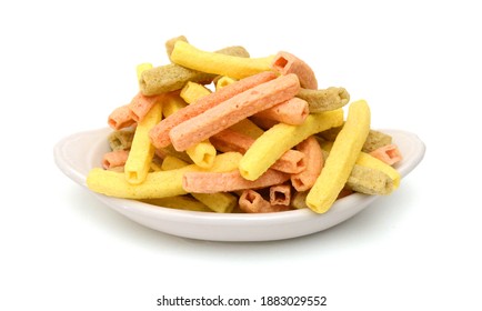 Naturally Baked Veggie Straws Made From Tomatoes, Spinach and Potatoes on white background 