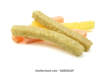 Naturally Baked Veggie Straws Made From Tomatoes, Spinach and Potatoes on white background 