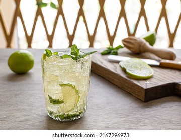 Naturally Fermented, Probiotic Lime Lemonade Soda. Summer Drink With Ice And Mint. Also Mojito Mocktail Or Cocktail.