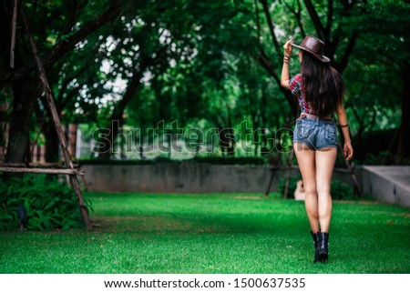 Similar – Image, Stock Photo Brunette girl holding surfboard over head and walking