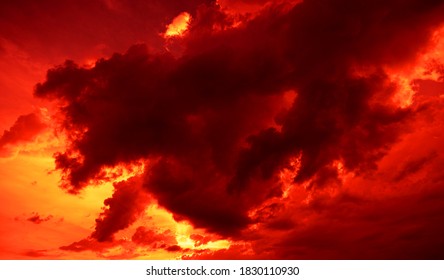Nature background. Dramatic clouds on the sky in red colors