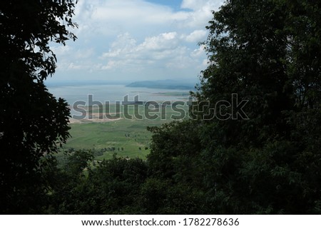 Nature backgrounds/Dramatic clouds and river with mountain and tree:  Hin chang si  view piont   at  Nam phong national park  khon kaen province  Thailand.