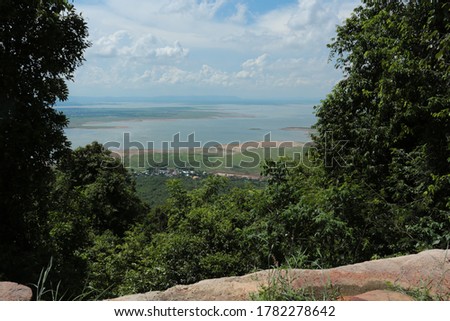 Nature backgrounds/Dramatic clouds and river with mountain and tree:  Hin chang si  view piont   at  Nam phong national park  khon kaen province  Thailand.
