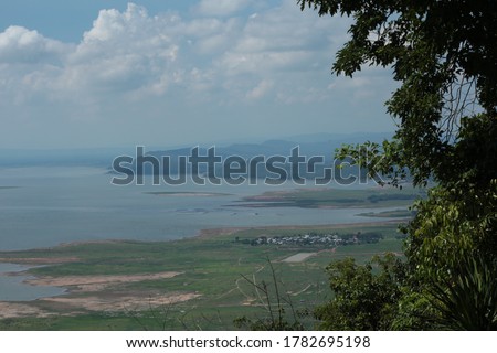 Nature backgrounds/Dramatic clouds and river with mountain and tree:  Hin chang si  view piont   at  Nam phong national park  khon kaen province  Thailand.