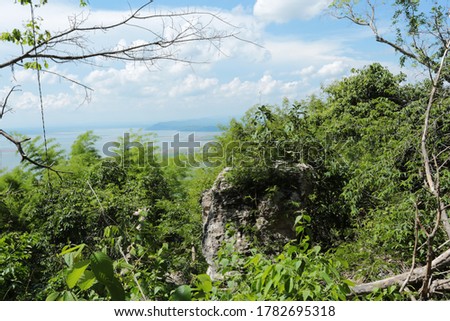 Nature backgrounds/Dramatic clouds and river with mountain and tree:  Hin chang si  view piont   at  Nam phong national park  khon kaen province  Thailand.