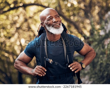 Nature, backpack and senior black man hiking in a forest for exercise, health and wellness. Sports, athlete and happy elderly African male hiker in retirement trekking in the woods on adventure trail