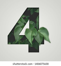 Nature Concept. Creative Number With Green Leaves On A Gray Background. Creative Typography, Chapter In The Presentation, Template. 4 Number Four.