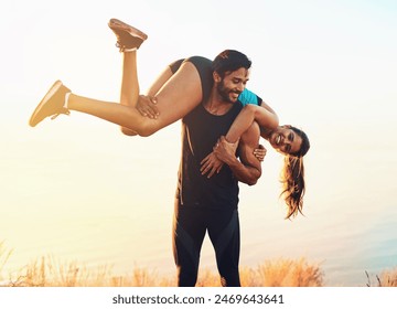 Nature, couple and carrying with love outdoor for romance, bonding and enjoying together in Spain. Vacation, holiday and adventure with happy people, man and woman while playful in relationship - Powered by Shutterstock