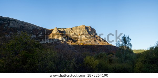 The nature of Crimea, mountains and sky. Grass\
and forests in the\
mountains.