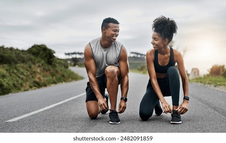 Nature, fitness and couple tie shoelace in road with running exercise for race or marathon training. Sports, outdoor and people of track and field athletes preparing for cardio workout in mountain. - Powered by Shutterstock