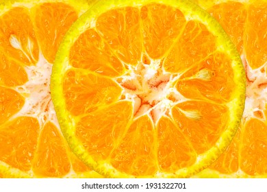 Nature And Food Background Of Orange Fruit A Top View Closeup Vivd Color Texture With Seed Of Yellow Sweet Citrus For Healthy Foods And Juice Ingredient