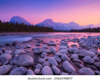 Nature. Landscape during sunrise. Round rocks on the riverbank. Mountains and forest. Vivid colours during dawn. Natural landscape. - Powered by Shutterstock