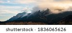 Nature Landscape featuring Flatirons Mountains in the Front Range of Boulder Colorado outside of Denver on a Evening Sunset with lots of Mist and Fog