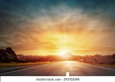 Nature landscape of sunset light above asphalt road