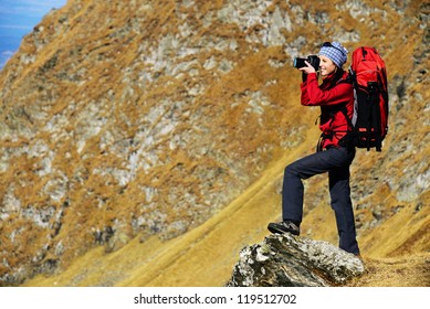 Nature Photographer Shooting In The Mountains