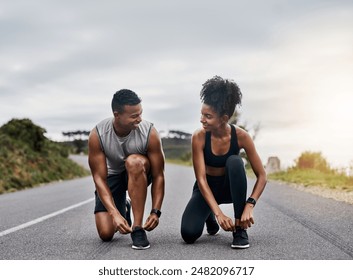 Nature, sports and couple tie shoelace in road with running exercise for race or marathon training. Fitness, outdoor and team of track and field athletes preparing for cardio workout in mountain. - Powered by Shutterstock