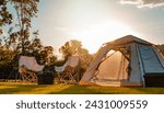 nature, tent, camp, landscape, summer, travel, adventure, mountain, sunset, camping. landscape is campground has campfire, tent, armchair near the lake with sunrise at mountains in the background.