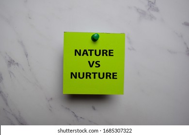 Nature Vs Nurture Write On Sticky Note Isolated On Office Desk